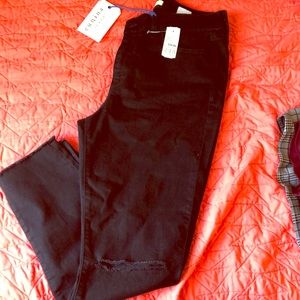 High waist black jeans with ripped knees